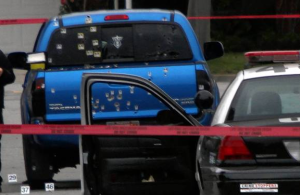 This is a blue Toyota Tacoma. Dorner's truck is a silver Nissan Titan. Oops.