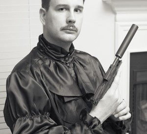 Mustache and gun, that's how you know he's conservative. Srsly, all three Wikipedia images feature firearms.